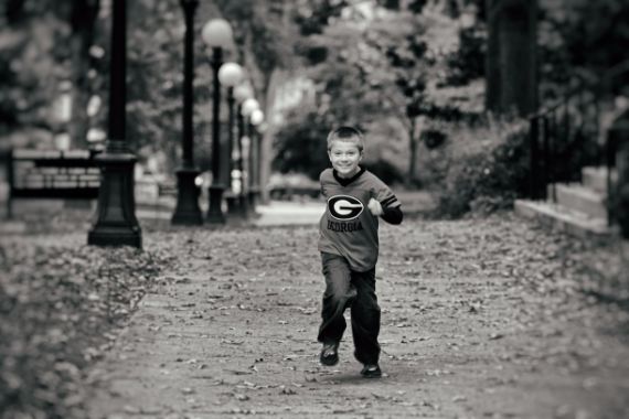 child running having fun